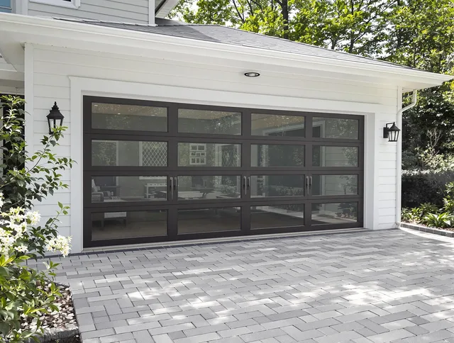 Avon Lake Garage Door Repair design specialist presenting custom garage door options to Avon Lake homeowner