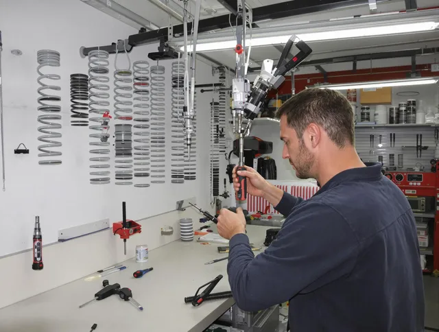 Avon Lake Garage Door Repair safety certified technician performing precision spring replacement in Avon Lake